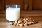 stockvault-almond-milk-with-almonds-on-wood171161
